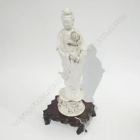 ORIENTAL WHITE PORCELAIN FIGURINE ON WOODEN BASE H. 480MM A/F
