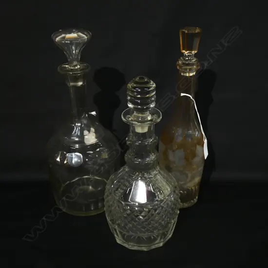 3 ANTIQUE GLASS DECANTERS H 360 MM