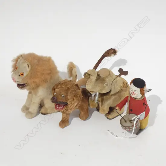FOUR ANTIQUE WIND UP ANIMAL TOYS; ELEPHANT / TWO LIONS & MONKEY W DRUM  - ALL HAVE KEYS