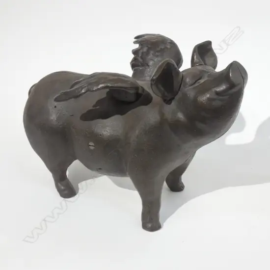 CAST IRON PIG ANGEL MONEYBOX WITH SOME COINS H. 210MM