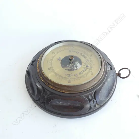 CARVED WOODEN FRAMED BAROMETER DIA 210MM