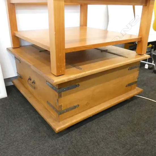 AN OAKCOFFEE TABLE WITH 2 HINGED LIDSIRON BOUND 890  MMSQ
