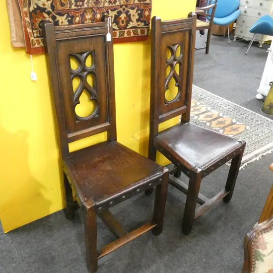 A PR C1910 GOTHIC STYLE HIGHBACK CHAIRS LEATHER SEATS