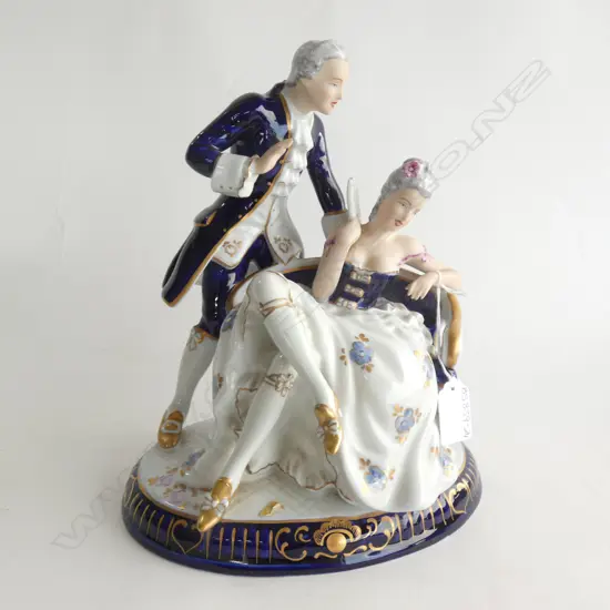 ROYAL DUX BOHEMIA PORCELAIN FIGURINE - LORD & LADY ON COUCH H. 270MM