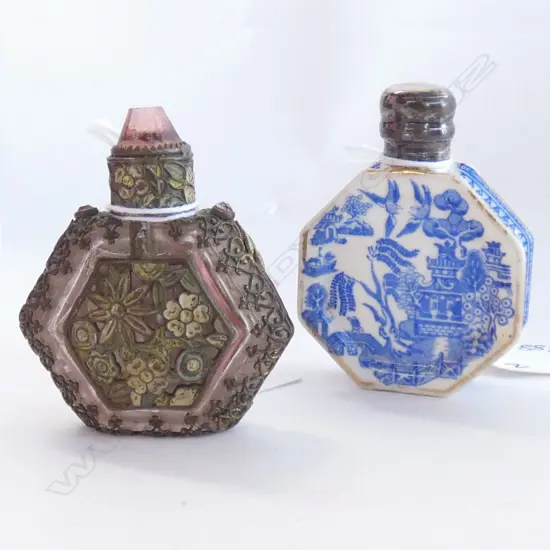 2 ANTIQUE FACETED PERFUME BOTTLES. B&W SIL.TOP...