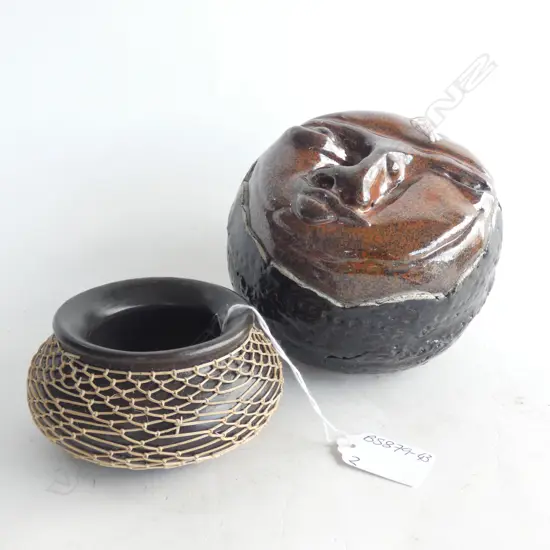 2 POTTERY BOWLS; ONE FACE SHAPE LID & SIG TO BASE / 1 WITH NETTING DIA 105MM