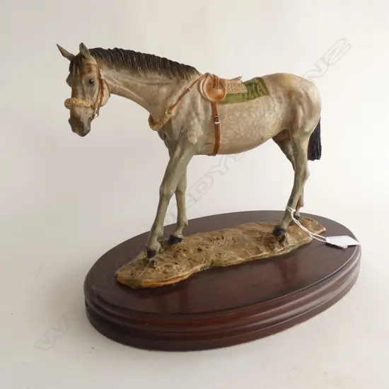 LG  HORSE ON WOODEN STAND L 330 H 255MM