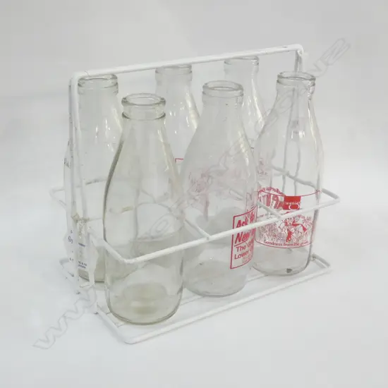 6 MILK BOTTLES IN METAL CARRIER