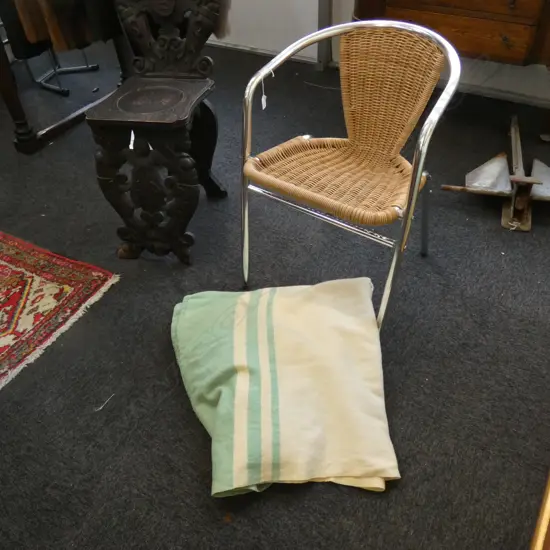 CHROME & CANE CHAIR AND OLD WOOLLEN BLANKET