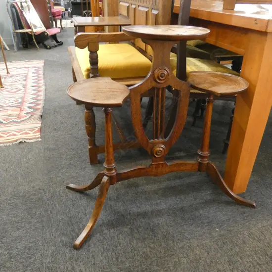 EDWARDIAN OAK SHIELD SHAPED 3 TIERED STAND H. 740MM 