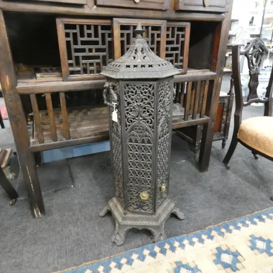 VICTORIAN CAST IRON CATHEDRAL STOVE WITH ORIGINAL RED GLASS PANELS H 870MM