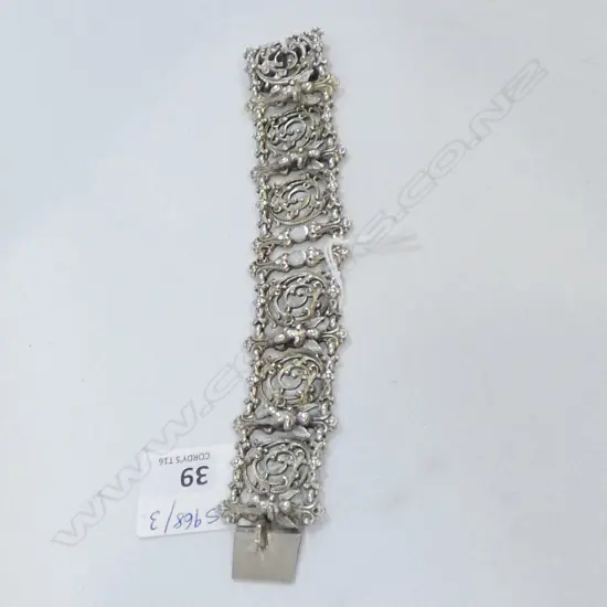 WIDE SILVER? BRACELET w. CHERUBS l 155 mm