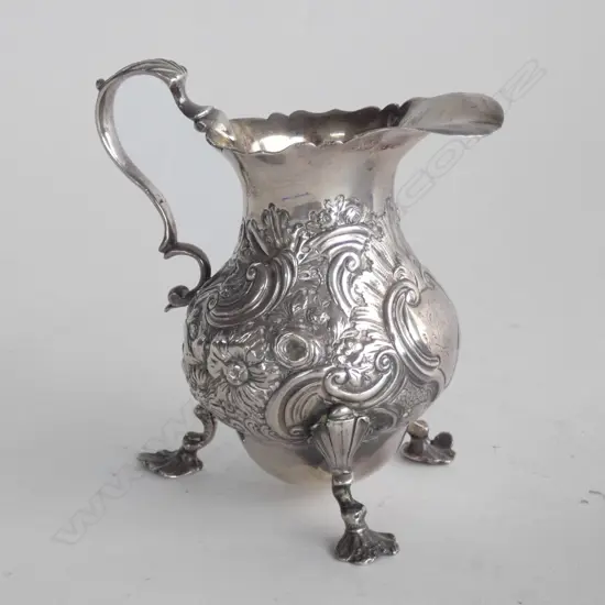 GEORGIAN SILVER CREAM JUG LATER SILVER BASE. 140gms