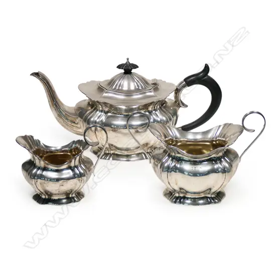 An early 20thC three-piece silver tea set,