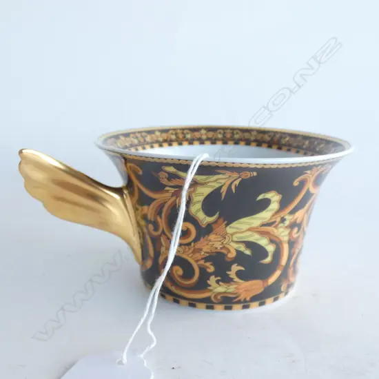 VERSACE BAROCCO CUP WITH GOLD WING HANDLE DIA 100MM
