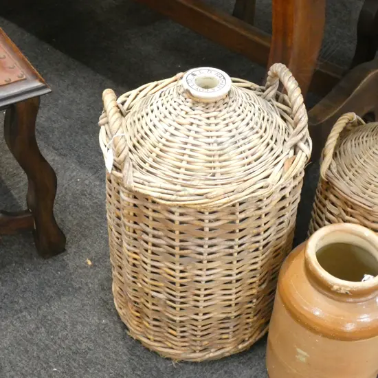 LARGE STONEWARE KEG IN CANE BINDING, MARKED TO TOP L.D. NATHAN 