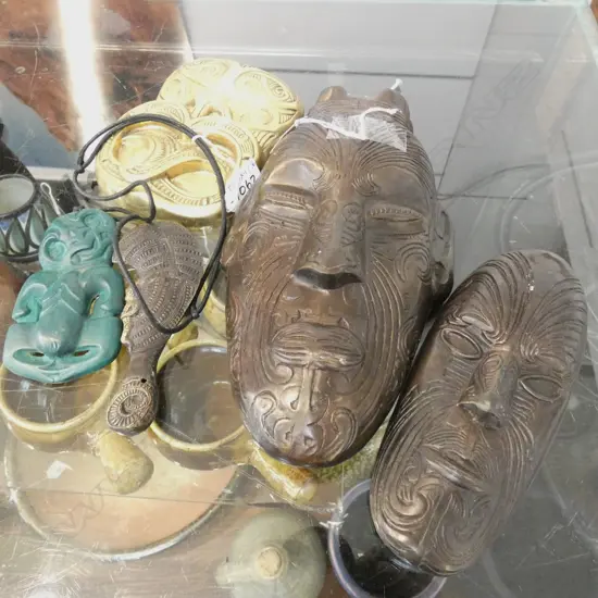 4 BRONZE PCES; 3 MAORI FACES + MINI PATU + TIKI PENDANT