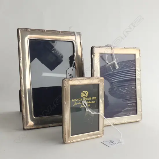 3 GRADUATED STG SILVER PHOTO FRAMES; ONE 155 X 115MM & ONE 185 X 135MM