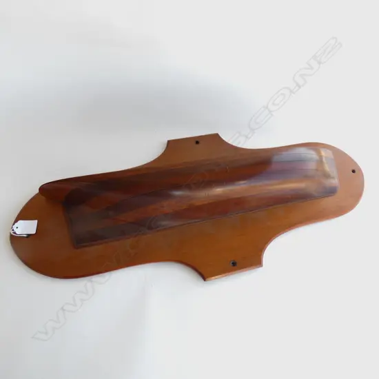 CARVED WOODEN BOAT HULL MOUNTED ON WOOD  L 720MM