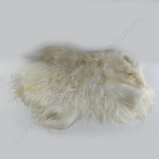 MONGOLIAN IVORY GOAT RUG - L 1000MM