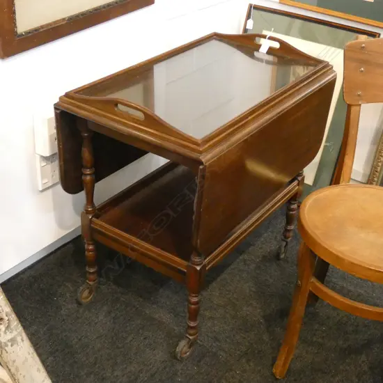 MAHOGANY DROP LEAF TEA TROLLEY...