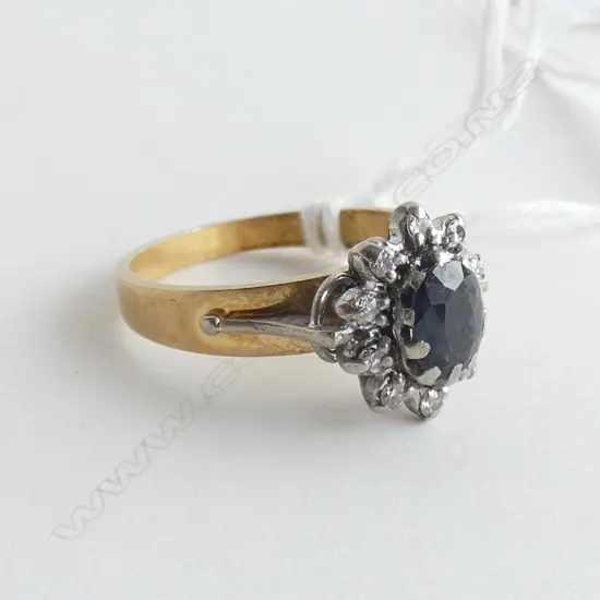 18CT SAPPHIRE AND DIAMOND CLUSTER RING 4.2 GRAMS CLAWS NEED ATTENTION