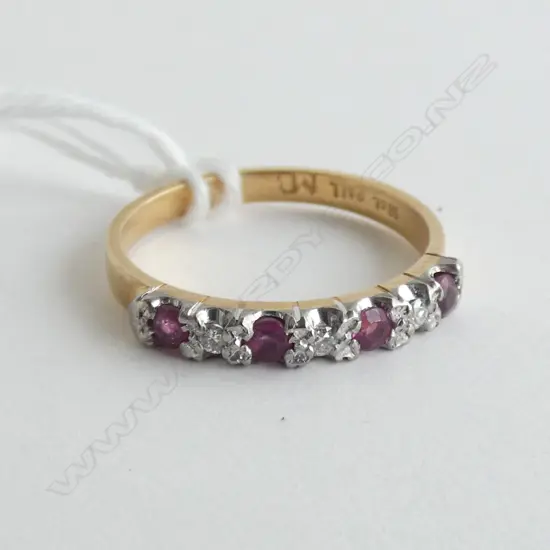 18CT 7 STONE RUBY & DIAMOND ETERNITY RING 2.7 GRAMS