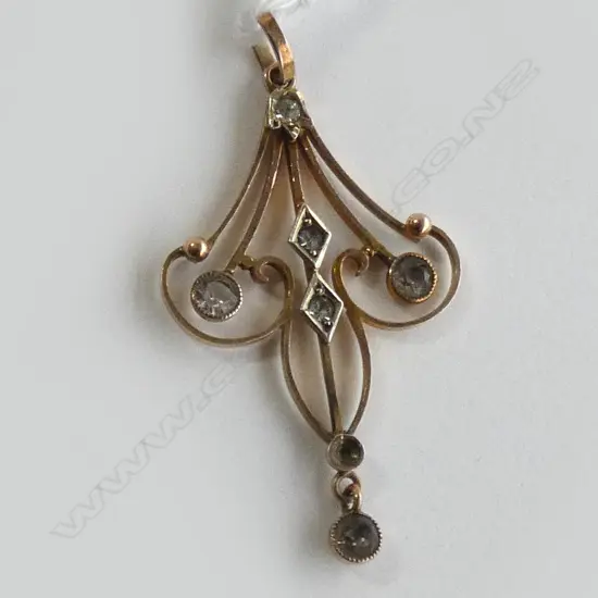 EDWARDIAN 9CT GOLD PENDANT AQUAMARINES?