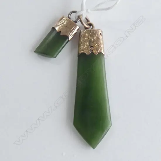 2 GREENSTONE PENDANTS ONE A/F 9CT FITTINGS