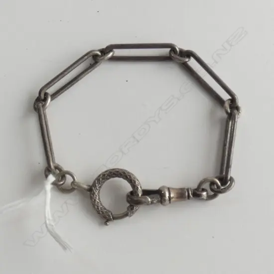 (010) SILVER BRACELET C1900. RAIL LINK W LGE DECORATIVE CLASP