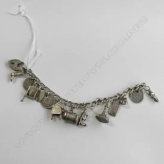 (17719) SILVER CHARM BRACELET 15 CHARMS