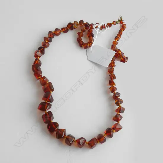 (20175)AMBER GRADUATING POLISHED NUGGET NECKLACE L.600mm