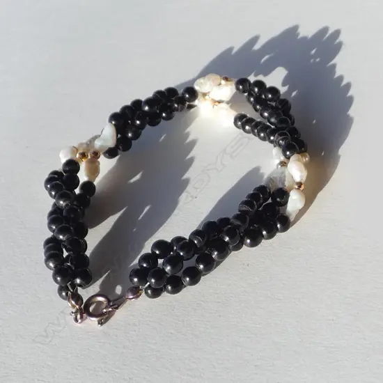 FRESHWATER PEARL & BLACK SEED 3-STRAND BRACELET