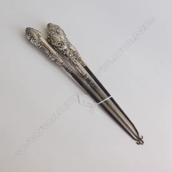 THREE ANTIQUE SILVER HANDLE BUTTON HOOKS 