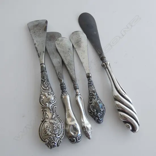 FIVE ANTIQUE SILVER HANDLE SHOE HORNS