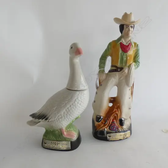 2 JIM BEAM DECANTERS; DUCK (H 300MM) & COWBOY (H380MM)