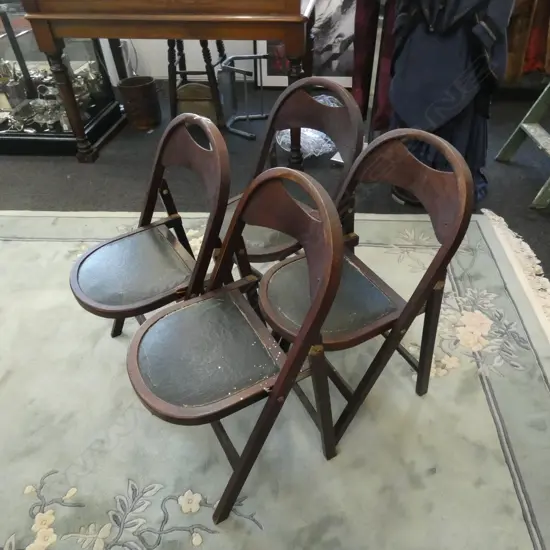 4 VINTAGE FOLDING CHAIRS...