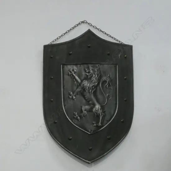 A ‘LION RAMPANT’ CURVED IRON SHIELD H628 W450mm   