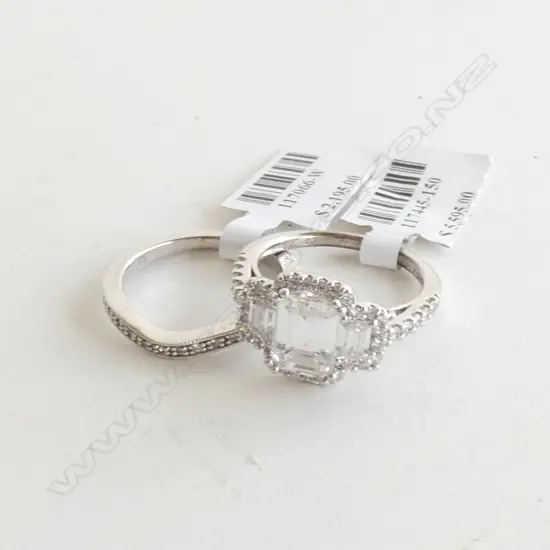 PR SILVER & CZ RINGS; ONE CURVED CZ BAND & ONE SQUARE CUT CZ