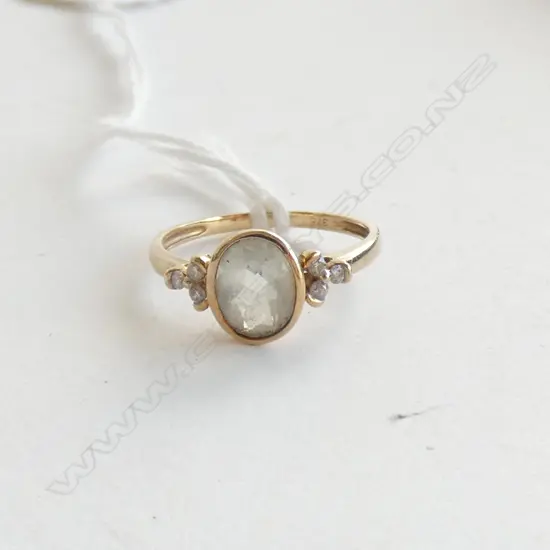 9CT GOLD RING WITH PALE  AQUA & DIAMOND