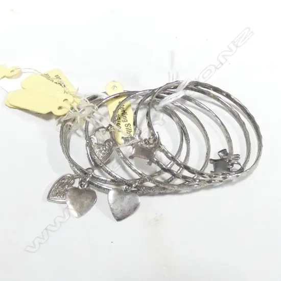 6 STG SILVER BABY BANGLES; 4 WITH HEART CHARM / 2 WITH TERRIER DOGS - 935 SILVER