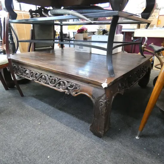 LARGE CARVED WOODEN COFFEE TABLE...