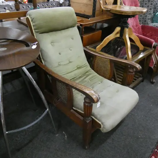 UPHOLSTERED OAK RECLINING CHAIR