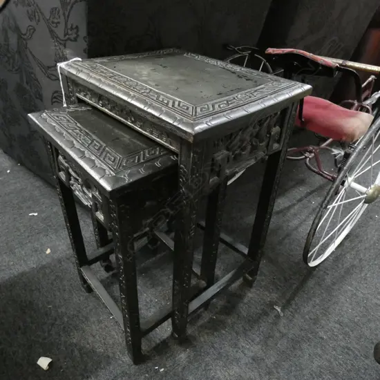 2 ORIENTAL CARVED WOODEN EBONIZED NESTING TABLES H.560mm
