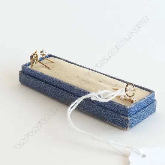 FOUR GOLD STICK PINS