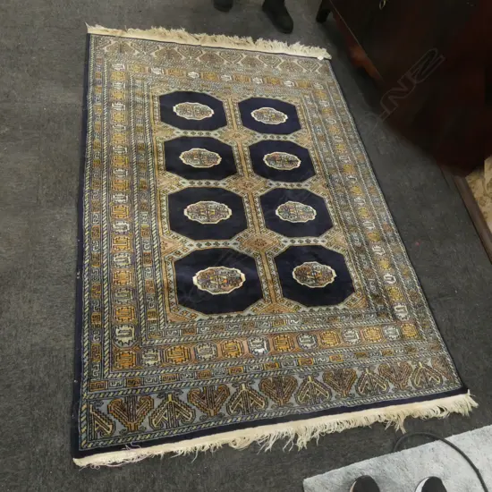 HAND KNOTTED WOOL PILE BLUE RUG 1950 x 1250mm SHOWING WEAR