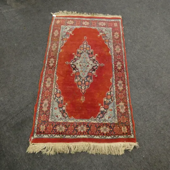 HAND KNOTTED WOOL PILE RUG 1350 x 790 mm.