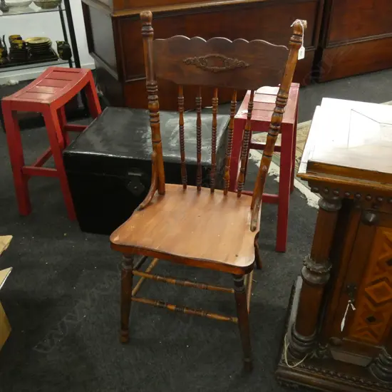 OLD WOODEN CHAIR HAS HAD BORER