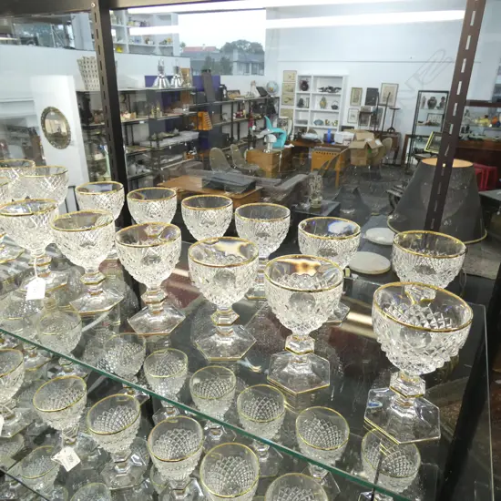 12 CORRE CRISTAL SMALL WINE GLASSES, GOLD RIMMED, ON HEXAGONAL KNOPPED STEMMS AND FOOT Ex Sultan of Brunei