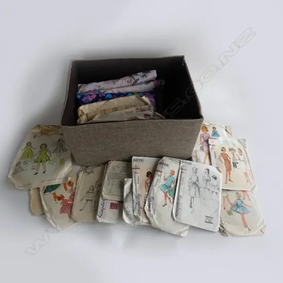 BOX OF VINTAGE GIRLS DRESS PATTERNS ETC & ASST FABRIC
